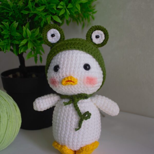 Handcrafted Amigurumi Duck Plush Toy with Frog Hat - Soft Crochet Doll for Baby, Toddler, and Home Décor