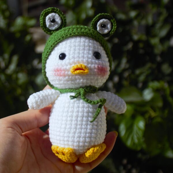 Handcrafted Amigurumi Duck Plush Toy with Frog Hat - Soft Crochet Doll for Baby, Toddler, and Home Décor